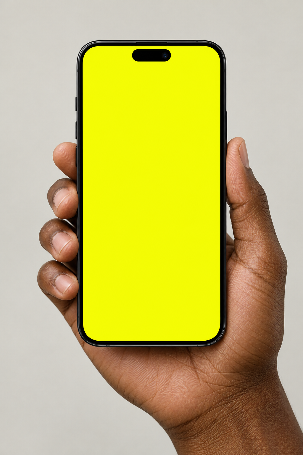 Celular reto segurado por uma mão, com tela amarela: Seu próximo nível. Com tração.